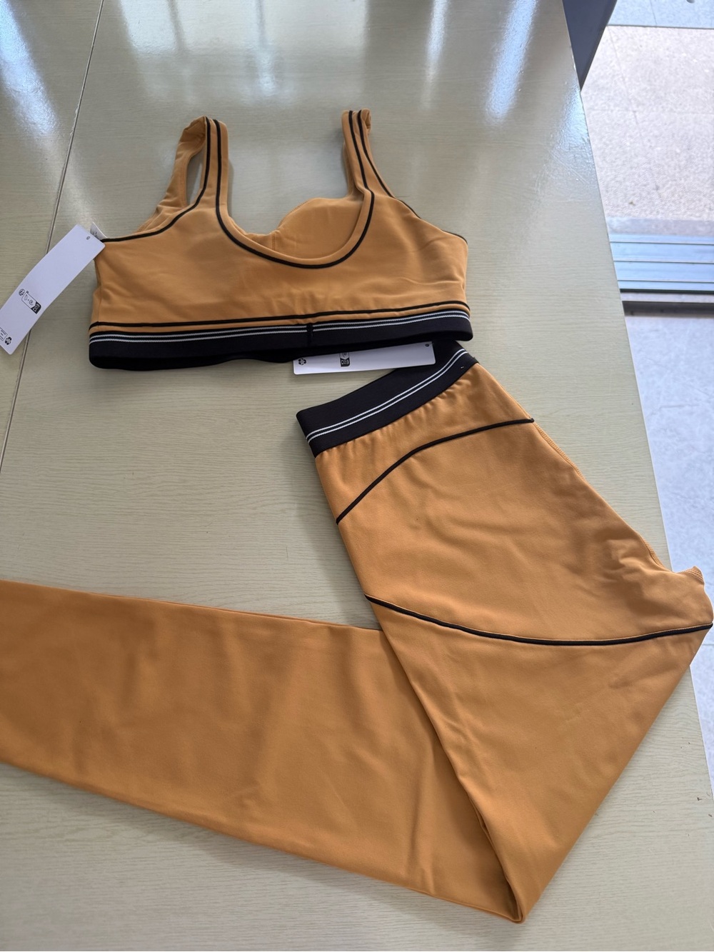 ALO Yoga Mustard Sports Bra with Black Trim - Picture 2 of 6